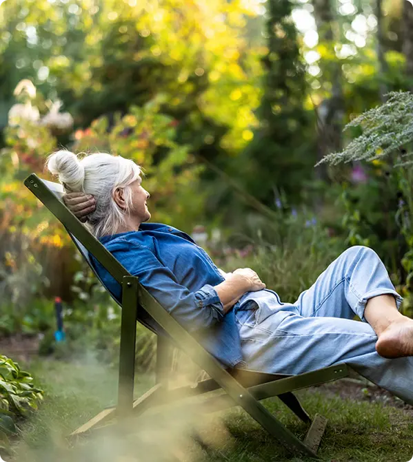 woman sitting outside on a chair