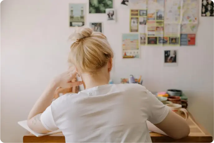 A young woman studying at her desk